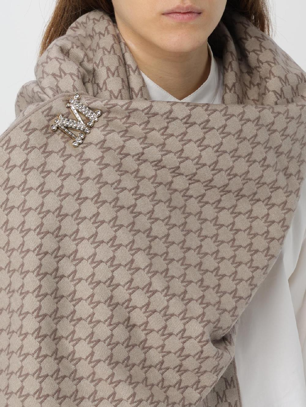 Giglio Spilla M Max Mara in ottone con strass incastonati Acquista Ora