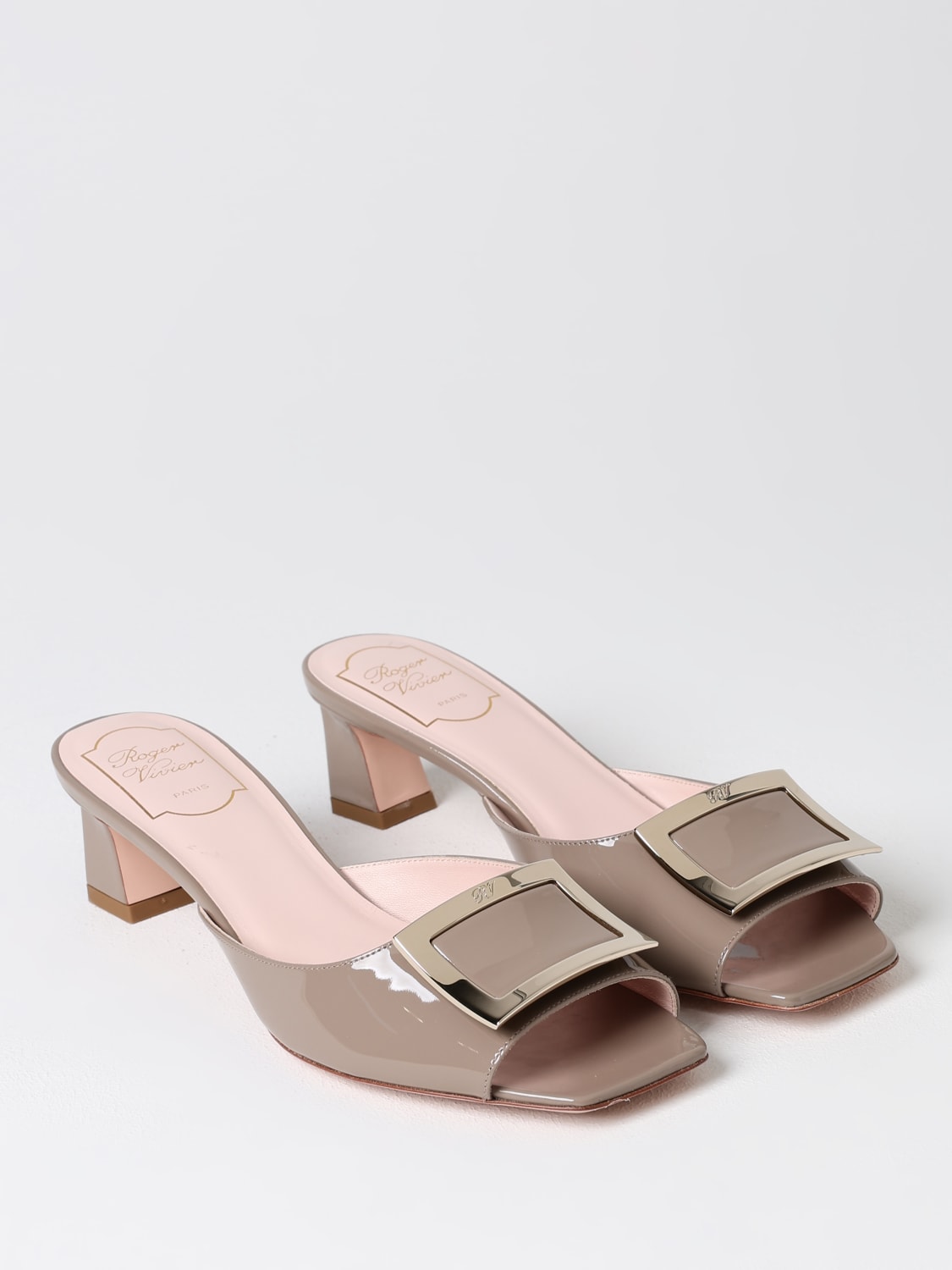 Giglio Mules Roger Vivier in vernice con fibbia decorativa Acquista Ora